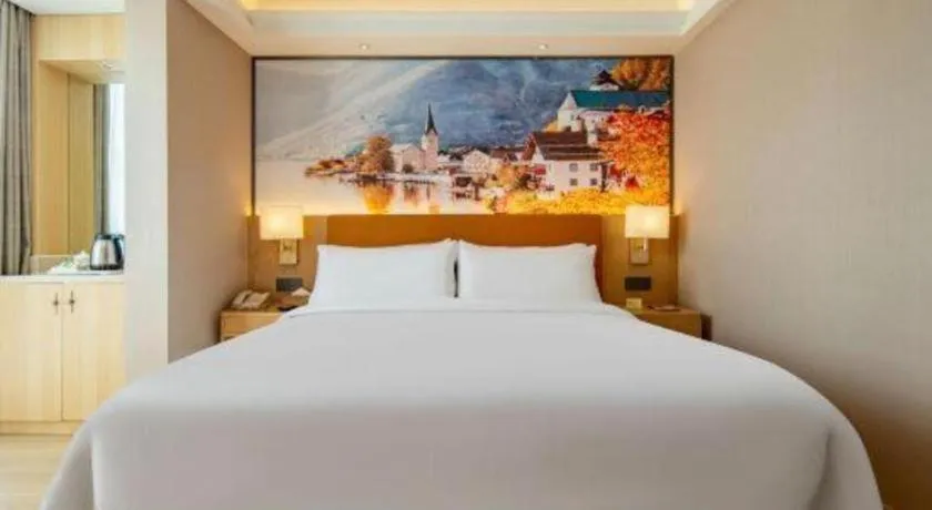 Bed in Vienna Hotel Hunan Jishou Fenghuang Ancient City