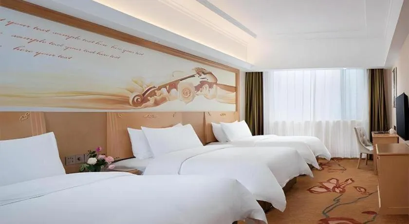 Bed in Vienna Hotel Hunan Jishou Fenghuang Ancient City