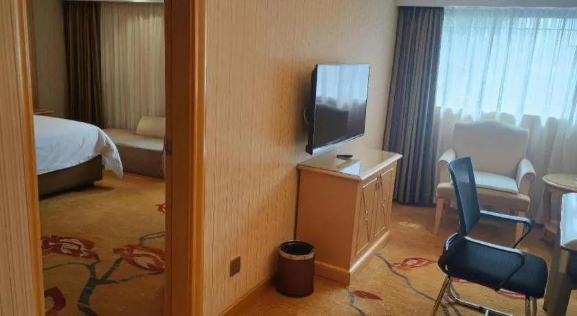 Bed in Vienna Hotel Hunan Jishou Fenghuang Ancient City