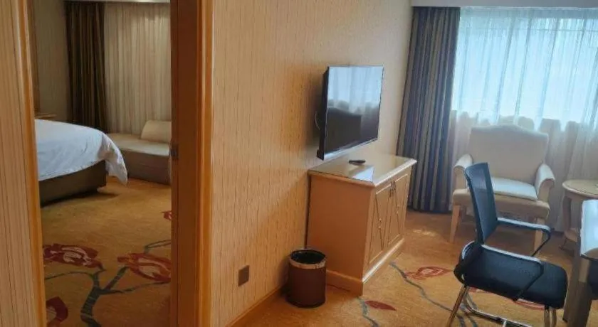 Bed in Vienna Hotel Hunan Jishou Fenghuang Ancient City