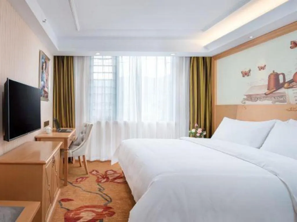 Bed in Vienna Hotel Hunan Jishou Fenghuang Ancient City