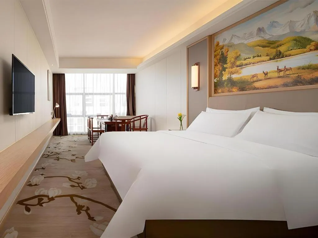 Bed in Vienna Hotel Guangdong Shantou Chaoyang Heping