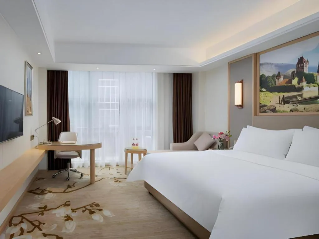 Bed in Vienna Hotel Guangdong Shantou Chaoyang Heping