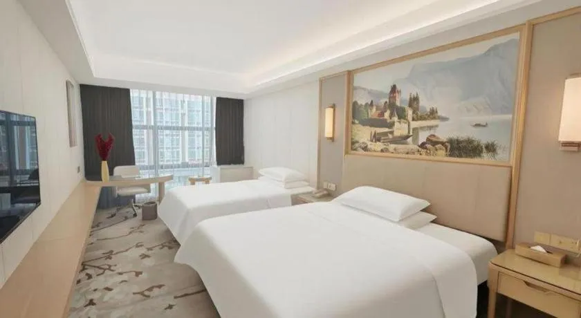 Bed in Vienna Hotel Guangdong Shantou Chaoyang Heping