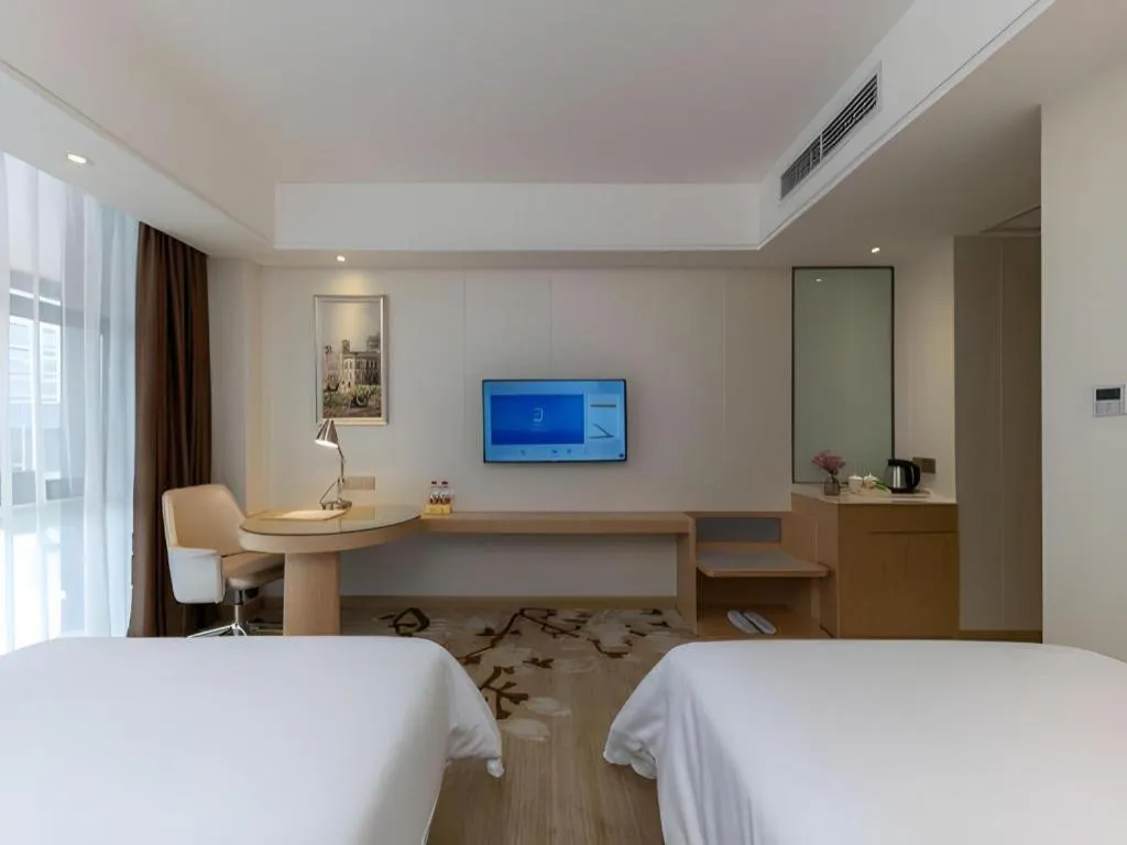 Bed in Vienna Hotel Guangdong Shantou Chaoyang Heping