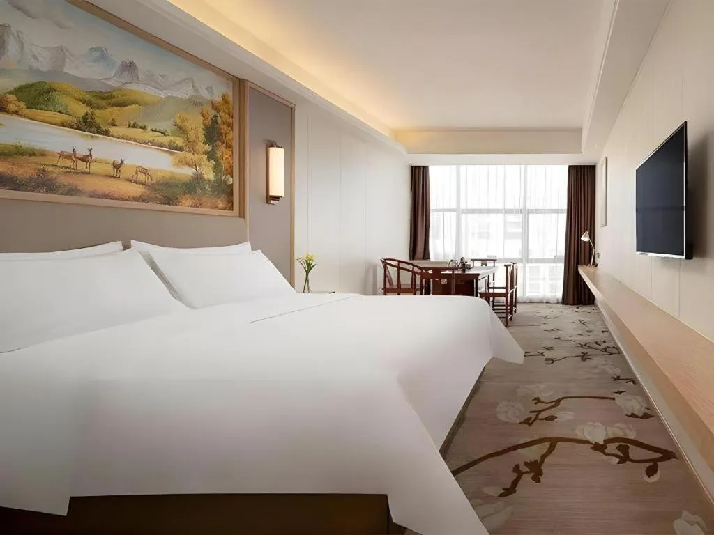 Bed in Vienna Hotel Guangdong Shantou Chaoyang Heping