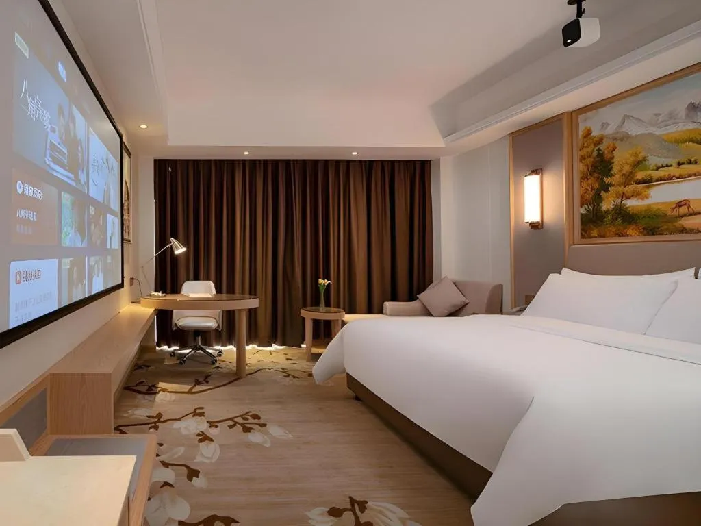 Bed in Vienna Hotel Guangdong Shantou Chaoyang Heping