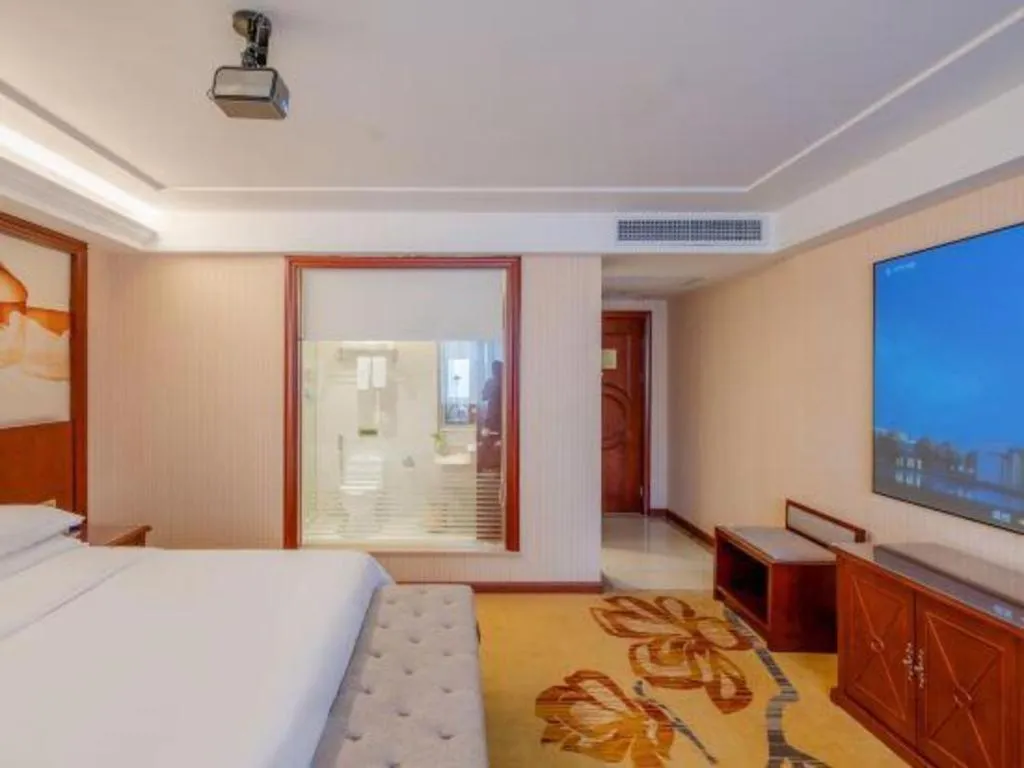 Bed in Vienna Hotel Guangdong Zhongshan Ancient Town Lighting Expo Center