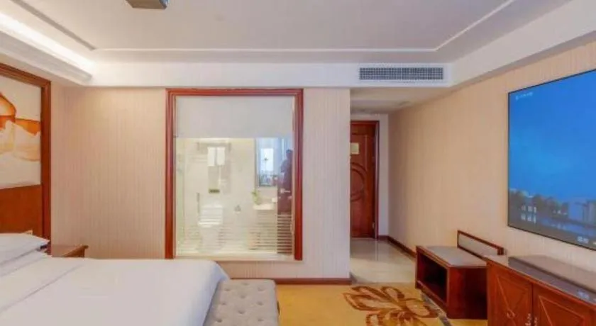 Bed in Vienna Hotel Guangdong Zhongshan Ancient Town Lighting Expo Center