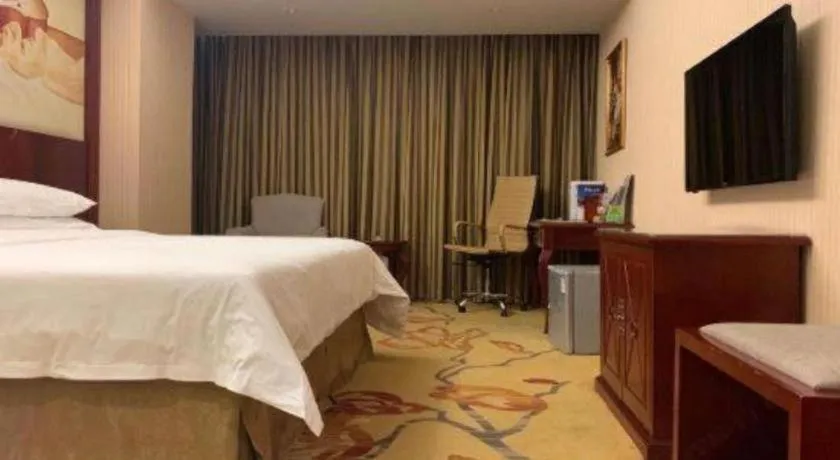 Bed in Vienna Hotel Guangdong Zhongshan Ancient Town Lighting Expo Center