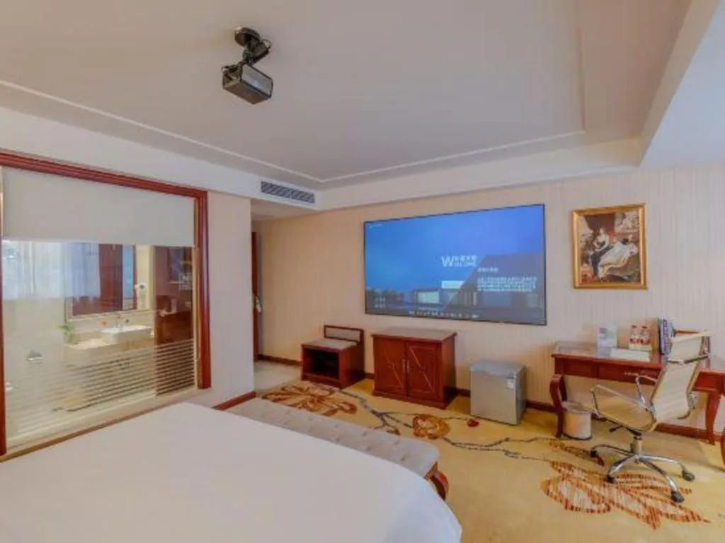 Bed in Vienna Hotel Guangdong Zhongshan Ancient Town Lighting Expo Center