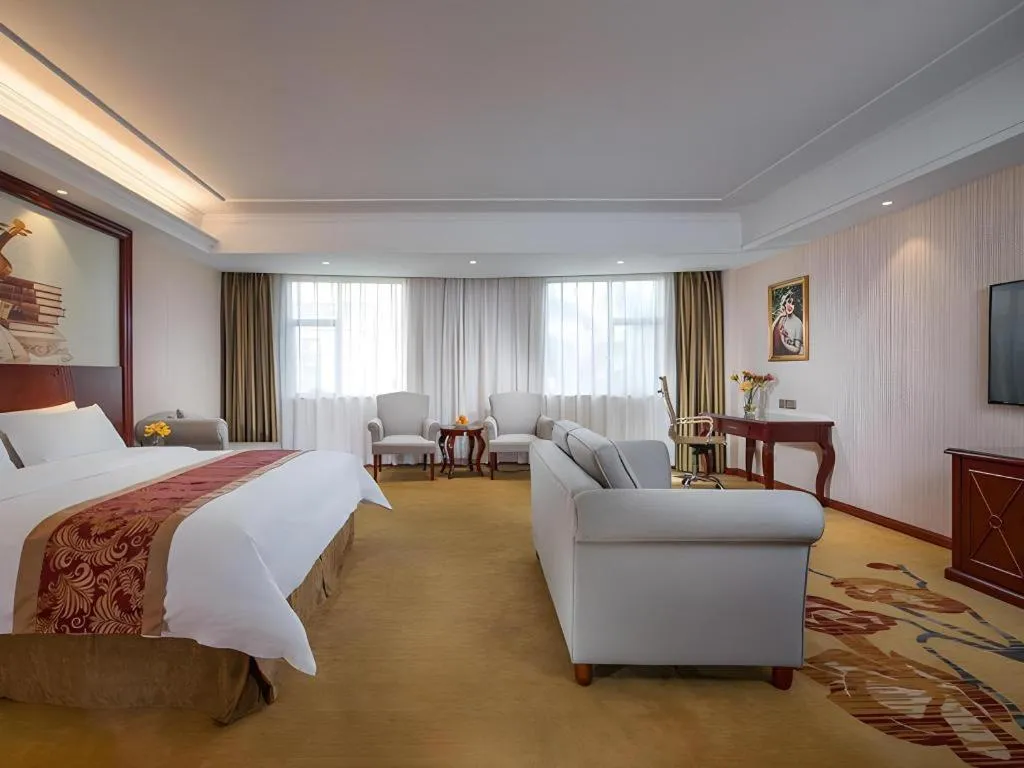 Bed in Vienna Hotel Guangdong Zhongshan Ancient Town Lighting Expo Center