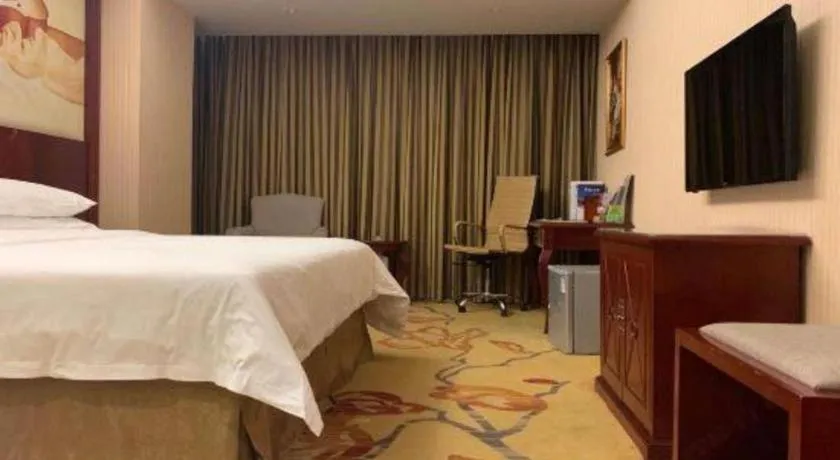 Bed in Vienna Hotel Guangdong Zhongshan Ancient Town Lighting Expo Center