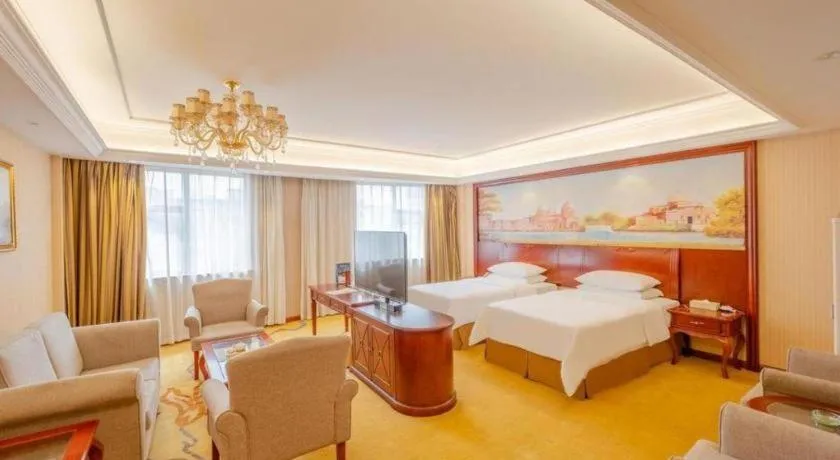 Bed in Vienna Hotel Guangdong Zhongshan Ancient Town Lighting Expo Center