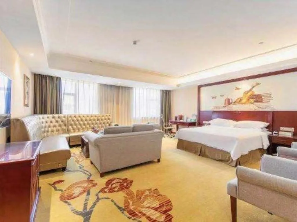 Bed in Vienna Hotel Guangdong Zhongshan Ancient Town Lighting Expo Center