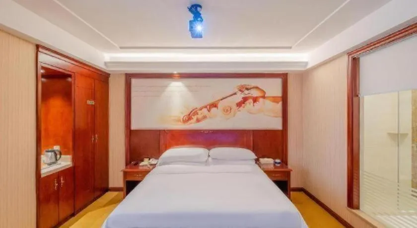Bed in Vienna Hotel Guangdong Zhongshan Ancient Town Lighting Expo Center