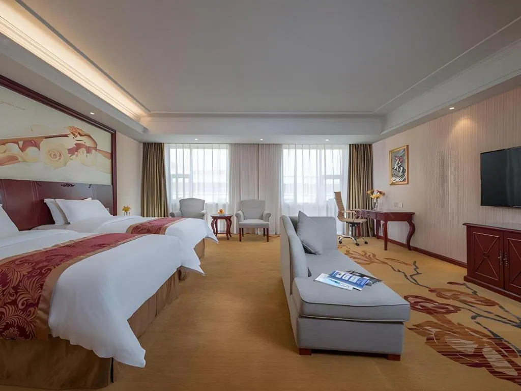 Bed in Vienna Hotel Guangdong Zhongshan Ancient Town Lighting Expo Center