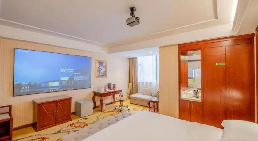 Bed in Vienna Hotel Guangdong Zhongshan Ancient Town Lighting Expo Center