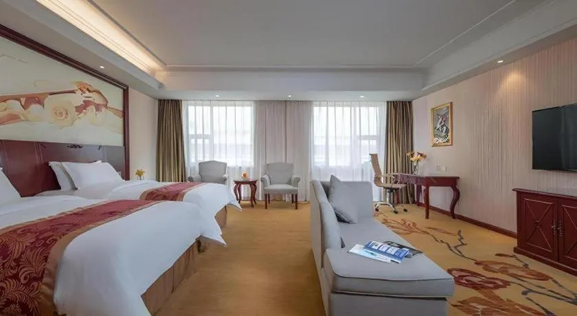 Bed in Vienna Hotel Guangdong Zhongshan Ancient Town Lighting Expo Center