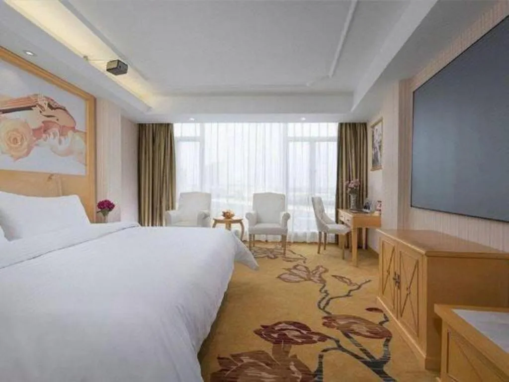 Bed in Vienna Hotel Guangdong Zhongshan Ancient Town Lighting Expo Center