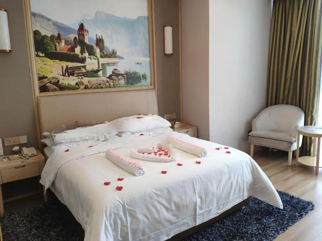 Bed in Vienna Hotel Fujian Fuqing Wanda Plaza