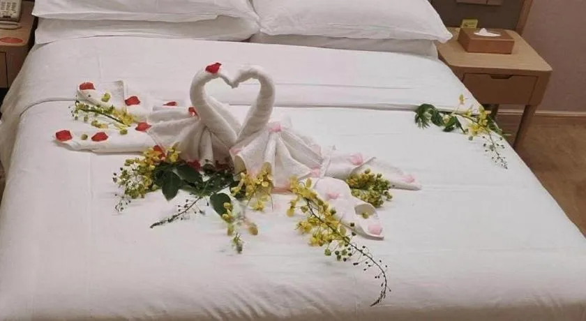 Bed in Vienna Hotel Fujian Fuqing Wanda Plaza