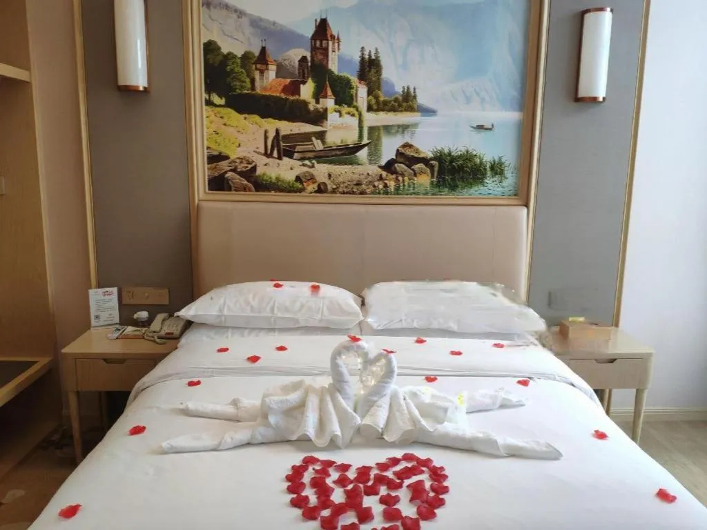 Bed in Vienna Hotel Fujian Fuqing Wanda Plaza