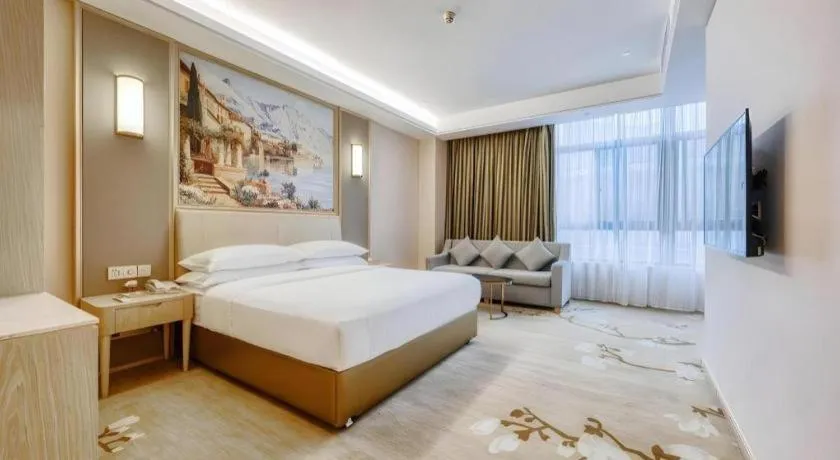Bed in Vienna Hotel Fujian Fuqing Wanda Plaza