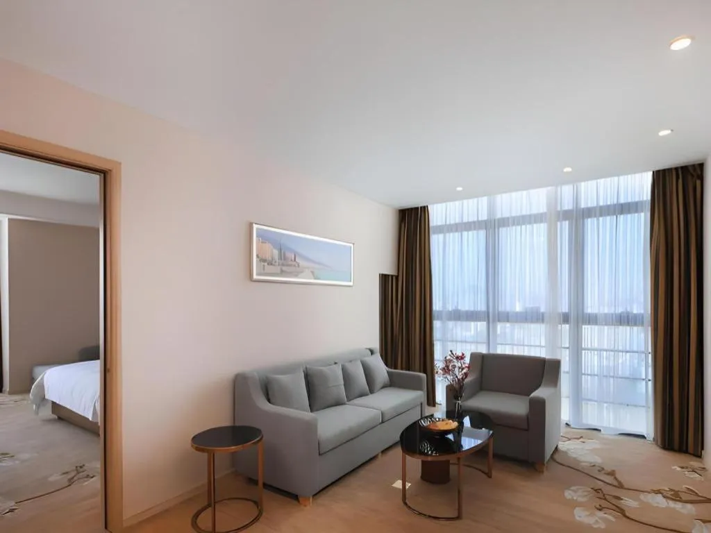 Bed in Vienna Hotel Fujian Fuqing Wanda Plaza