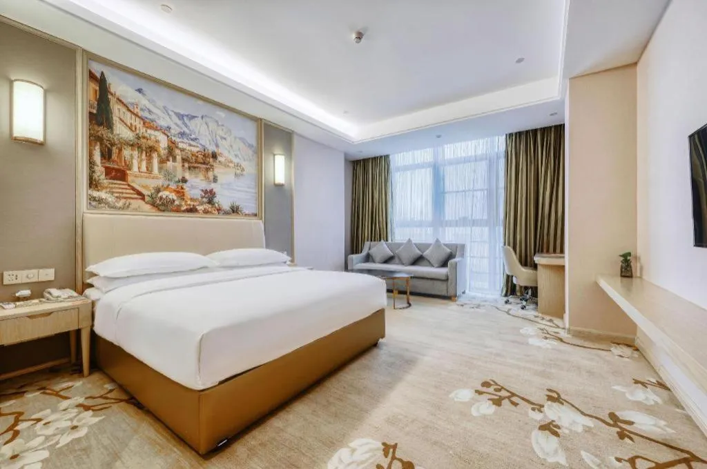 Bed in Vienna Hotel Fujian Fuqing Wanda Plaza