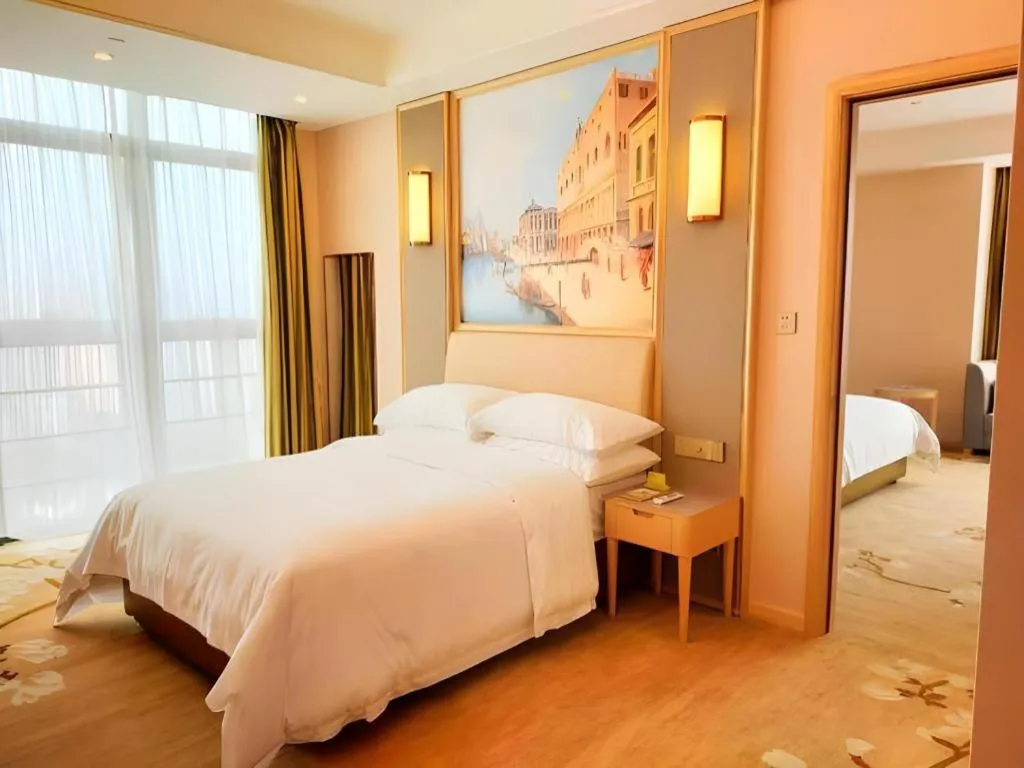 Bed in Vienna Hotel Fujian Fuqing Wanda Plaza