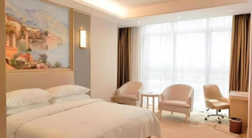 Bed in Vienna Hotel Fujian Fuqing Wanda Plaza
