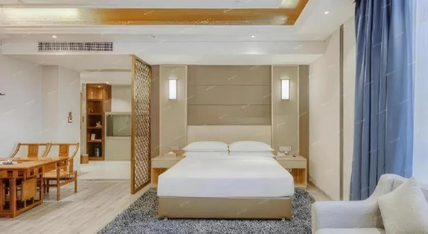 Bed in Vienna Hotel Fujian Fuqing Wanda Plaza