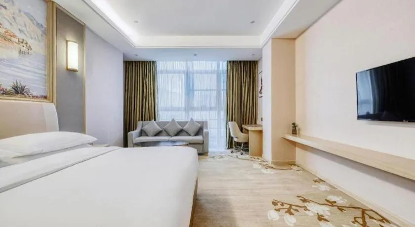 Bed in Vienna Hotel Fujian Fuqing Wanda Plaza