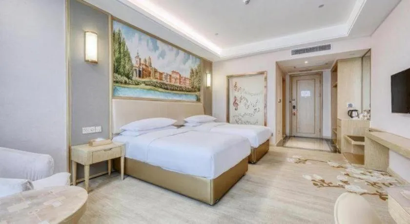Bed in Vienna Hotel Fujian Fuqing Wanda Plaza