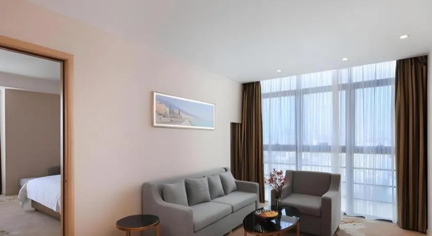 Bed in Vienna Hotel Fujian Fuqing Wanda Plaza