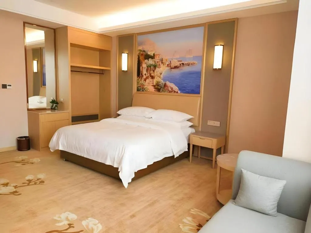 Bed in Vienna Hotel Fujian Fuqing Wanda Plaza