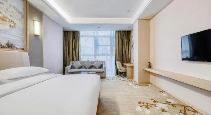 Bed in Vienna Hotel Fujian Fuqing Wanda Plaza