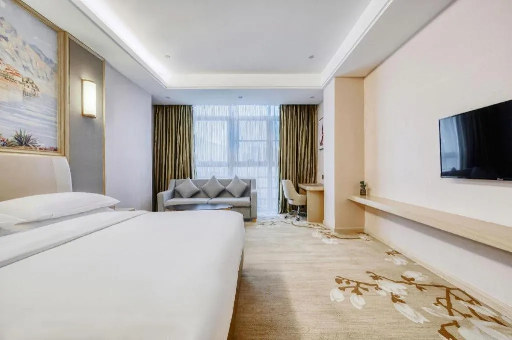 Bed in Vienna Hotel Fujian Fuqing Wanda Plaza