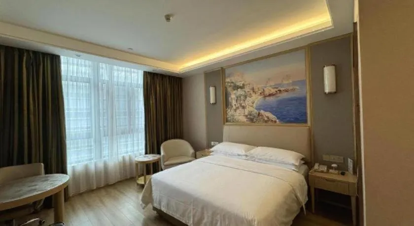 Bed in Vienna Hotel Fujian Fuqing Wanda Plaza