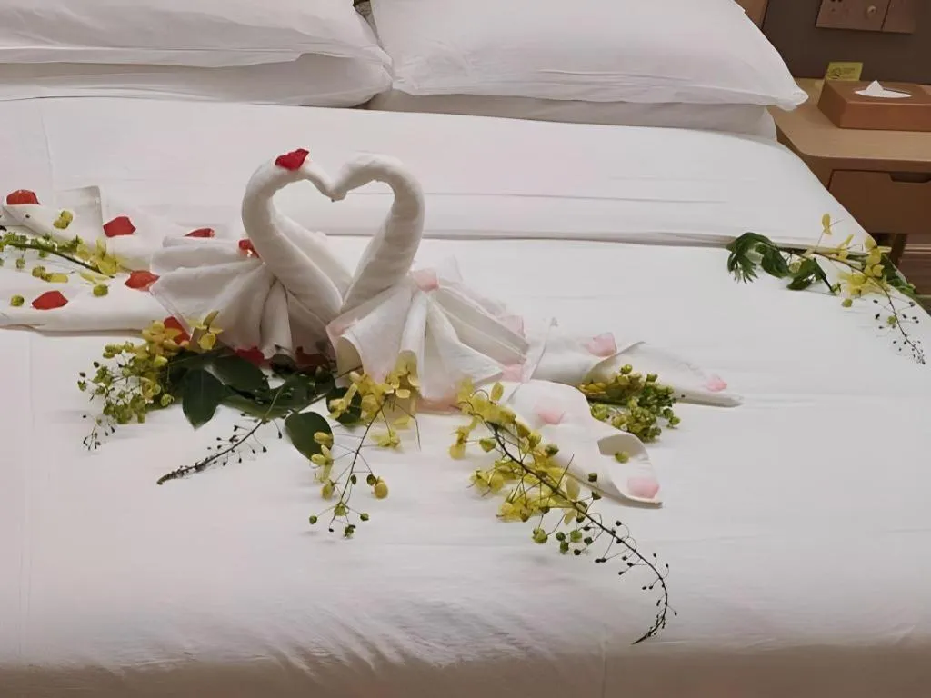 Bed in Vienna Hotel Fujian Fuqing Wanda Plaza