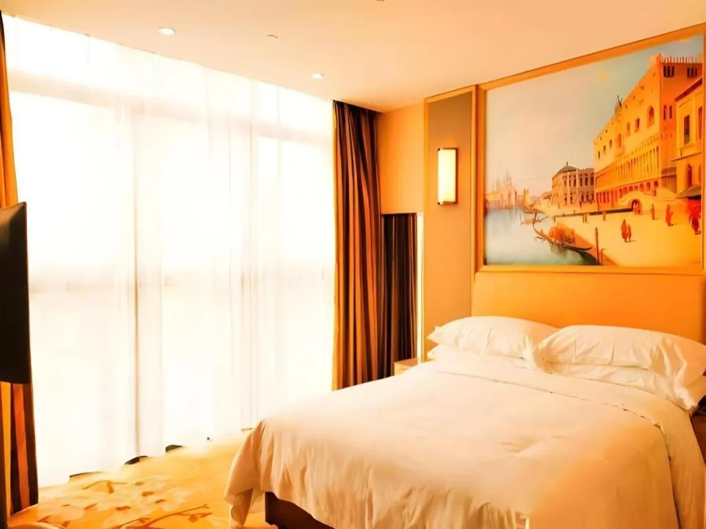 Bed in Vienna Hotel Fujian Fuqing Wanda Plaza