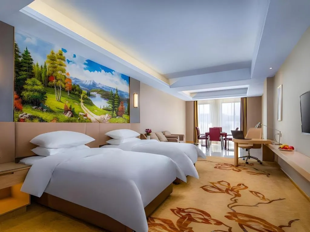 Bed in Vienna Hotel Anhui Fuyang Funan Bailing Apartment