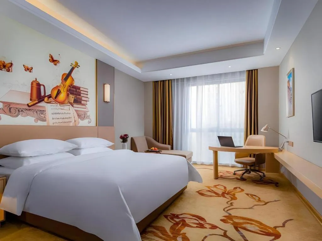 Bed in Vienna Hotel Anhui Fuyang Funan Bailing Apartment