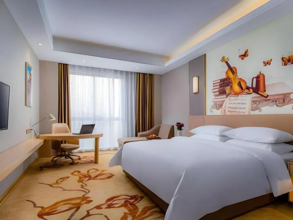 Bed in Vienna Hotel Anhui Fuyang Funan Bailing Apartment