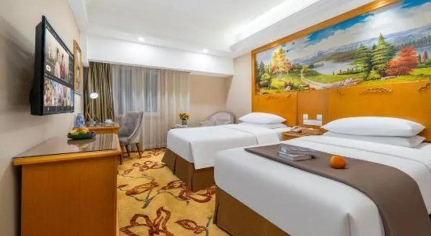 Bed in Vienna Hotel Tianjin Zhongbei Town