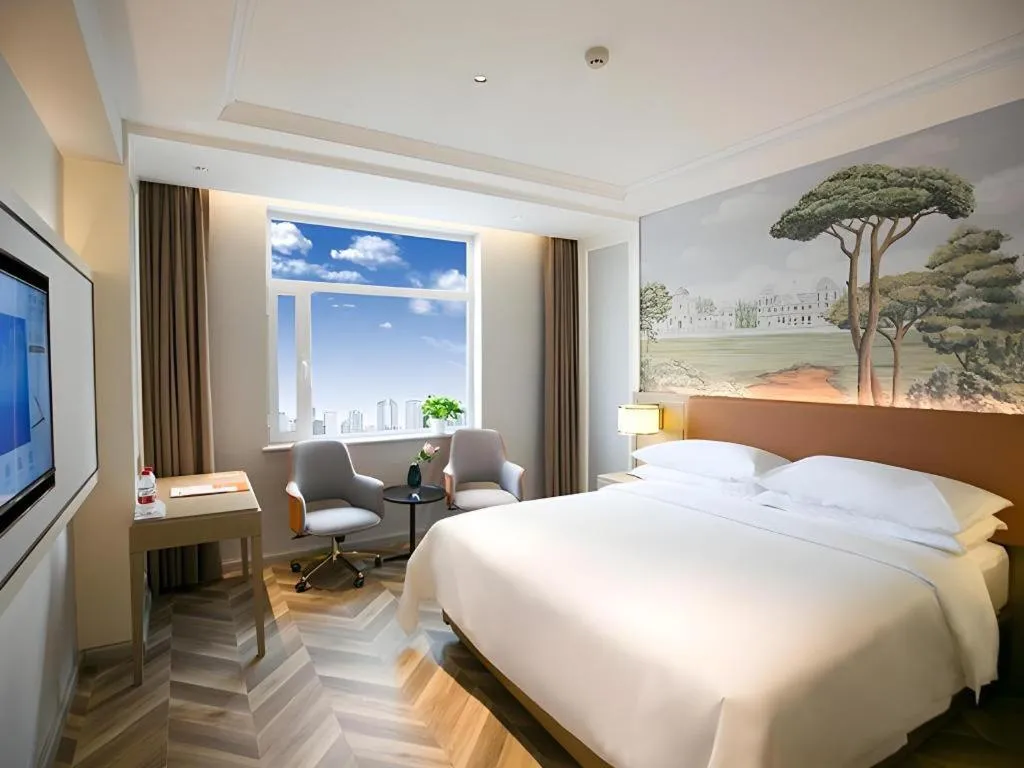 Bed in Vienna Hotel Jinan Beiyuan Street Red Star Macalline