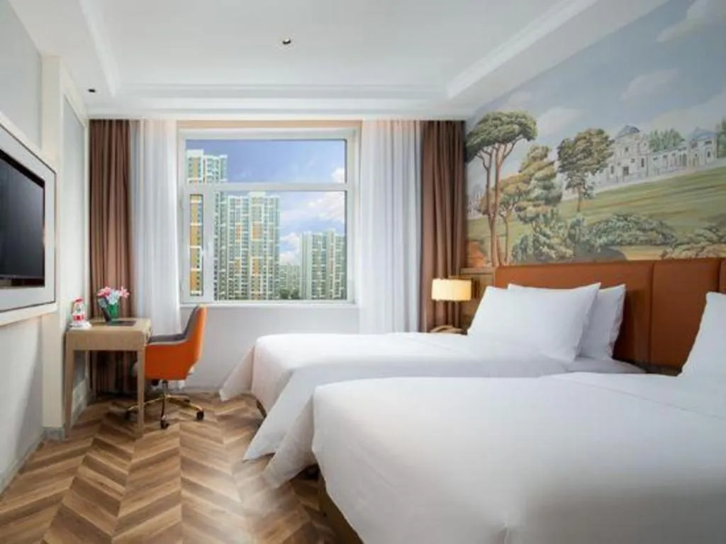 Bed in Vienna Hotel Jinan Beiyuan Street Red Star Macalline