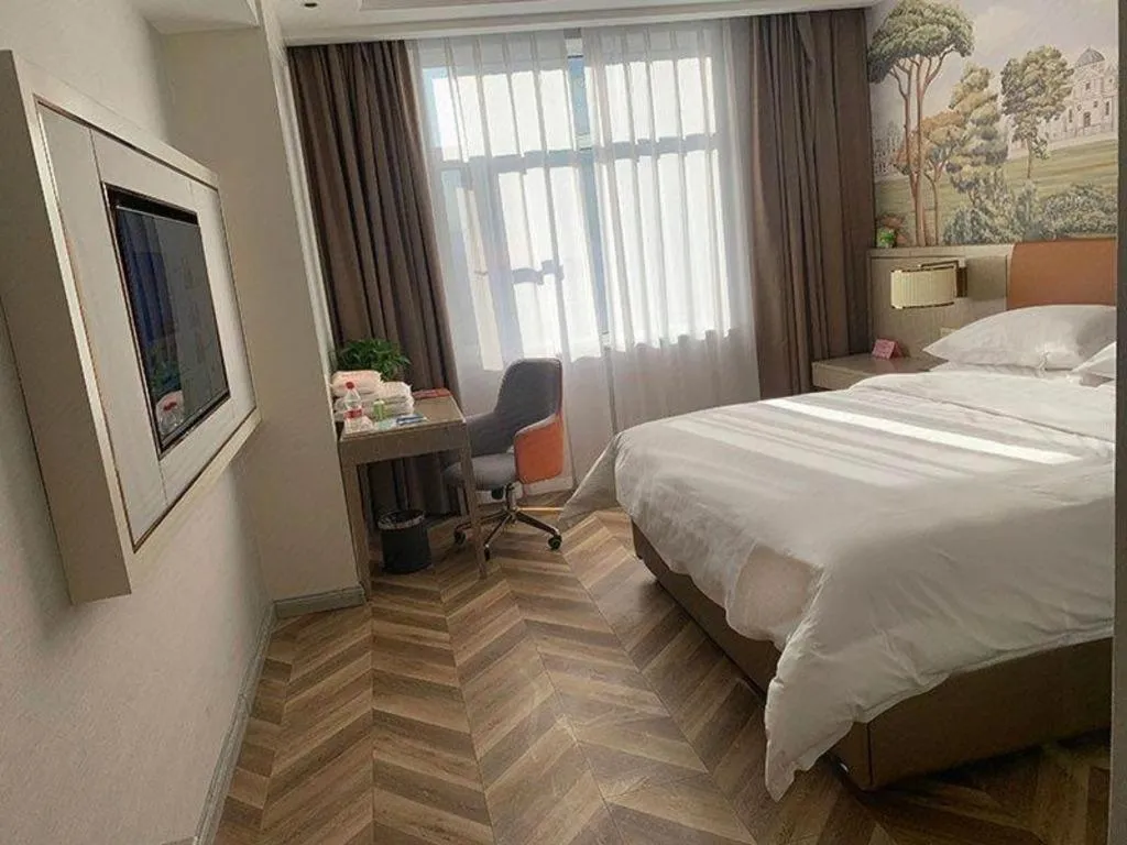 Bed in Vienna Hotel Jinan Beiyuan Street Red Star Macalline