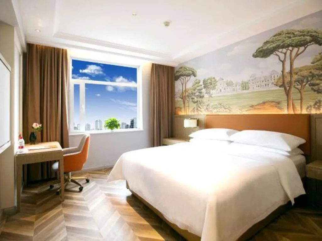 Bed in Vienna Hotel Jinan Beiyuan Street Red Star Macalline